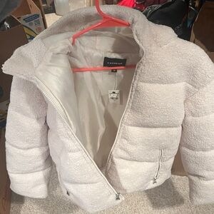 Brand new with tags, never worn. It was a present but it’s not my style.